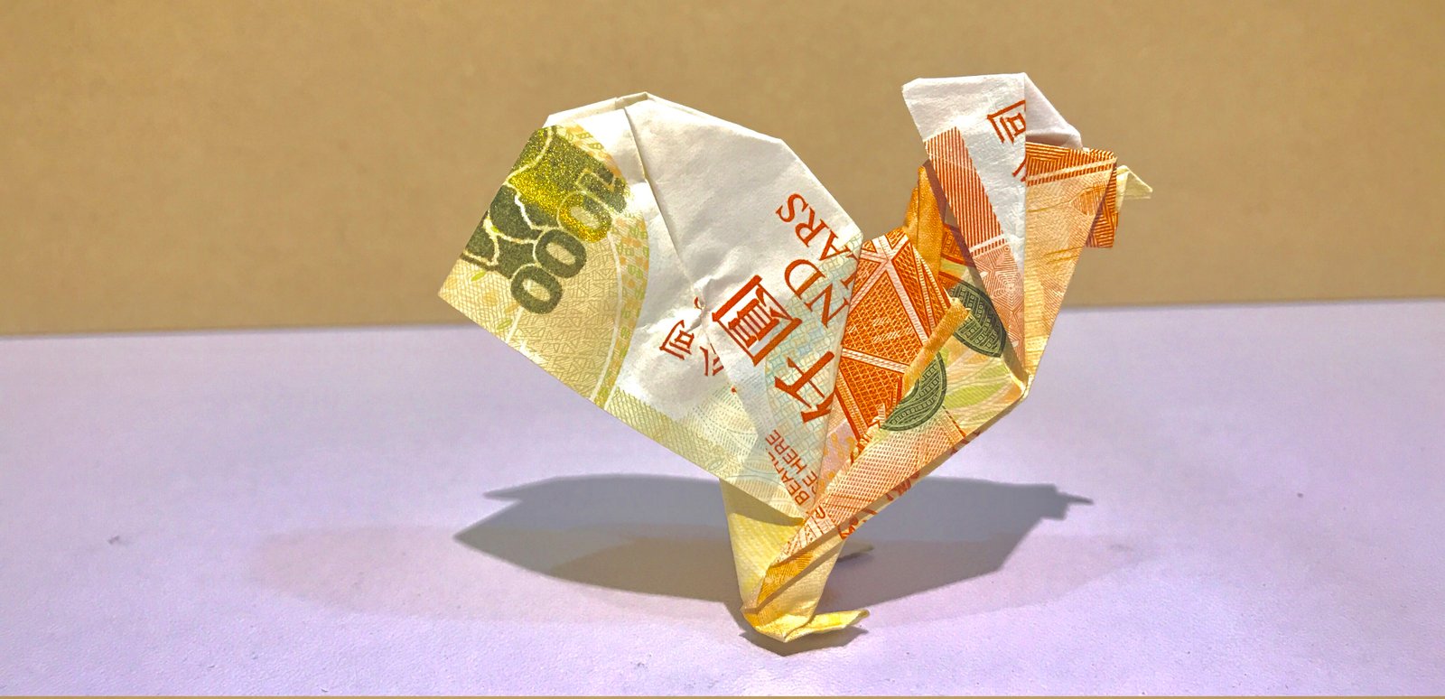 摺金雞